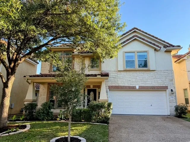 front view of house with a yard