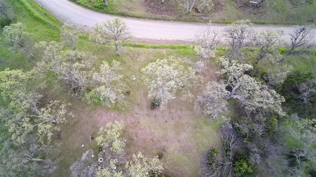 6962 Roundup Drive Corning, CA 96021 - Photo 5 of 9 a view of a lake with a yard