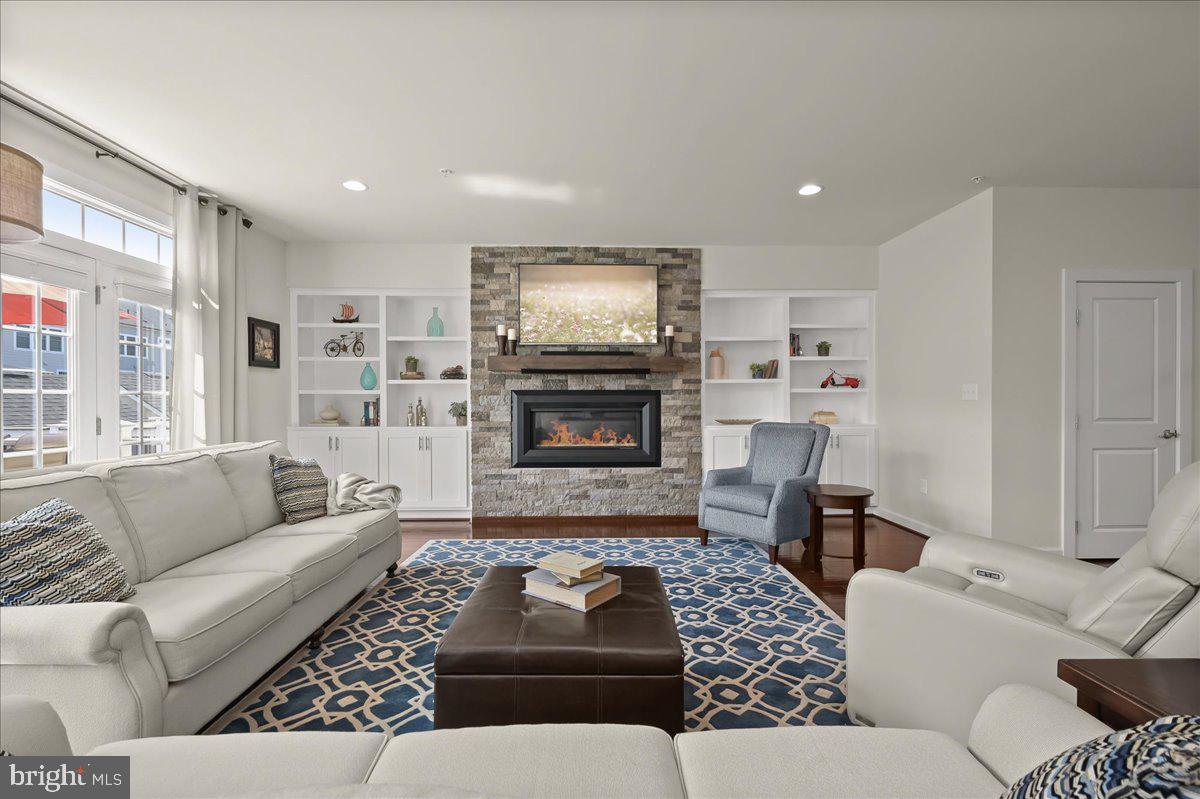 11285 Terrace Lane Fulton, MD 20759 - Photo 20 of 52 a living room with furniture and a fireplace