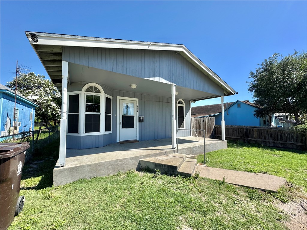 710 East C Avenue Kingsville, TX 78363 - Photo 13 of 13 a front view of a house with a yard