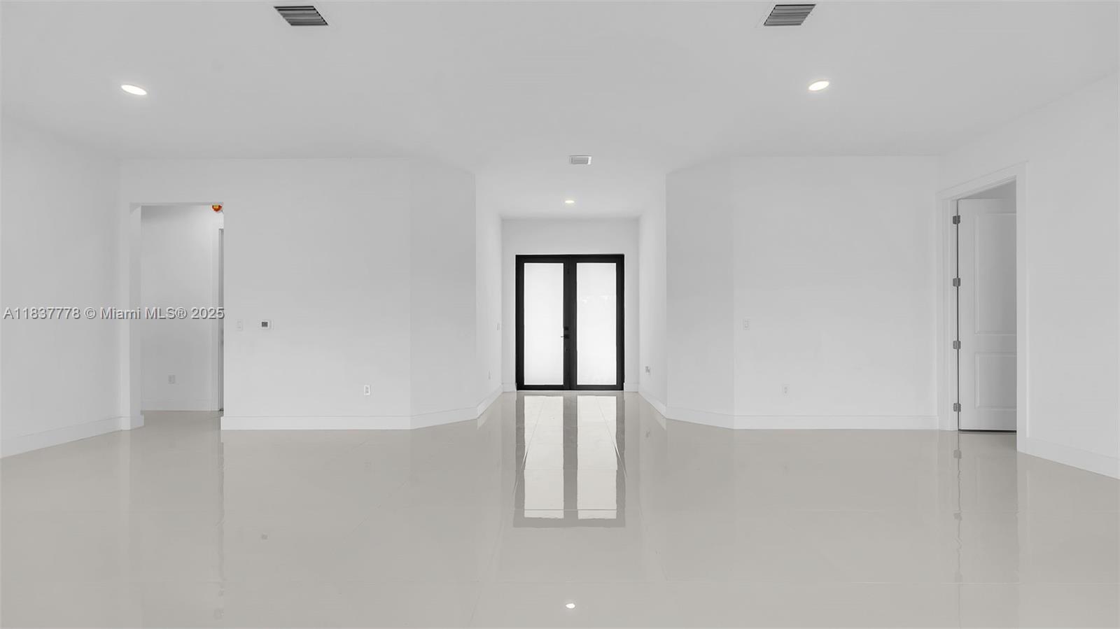 23120 Southwest 154th Court Miami, FL 33170 - Photo 12 of 51 an empty room with windows and closet