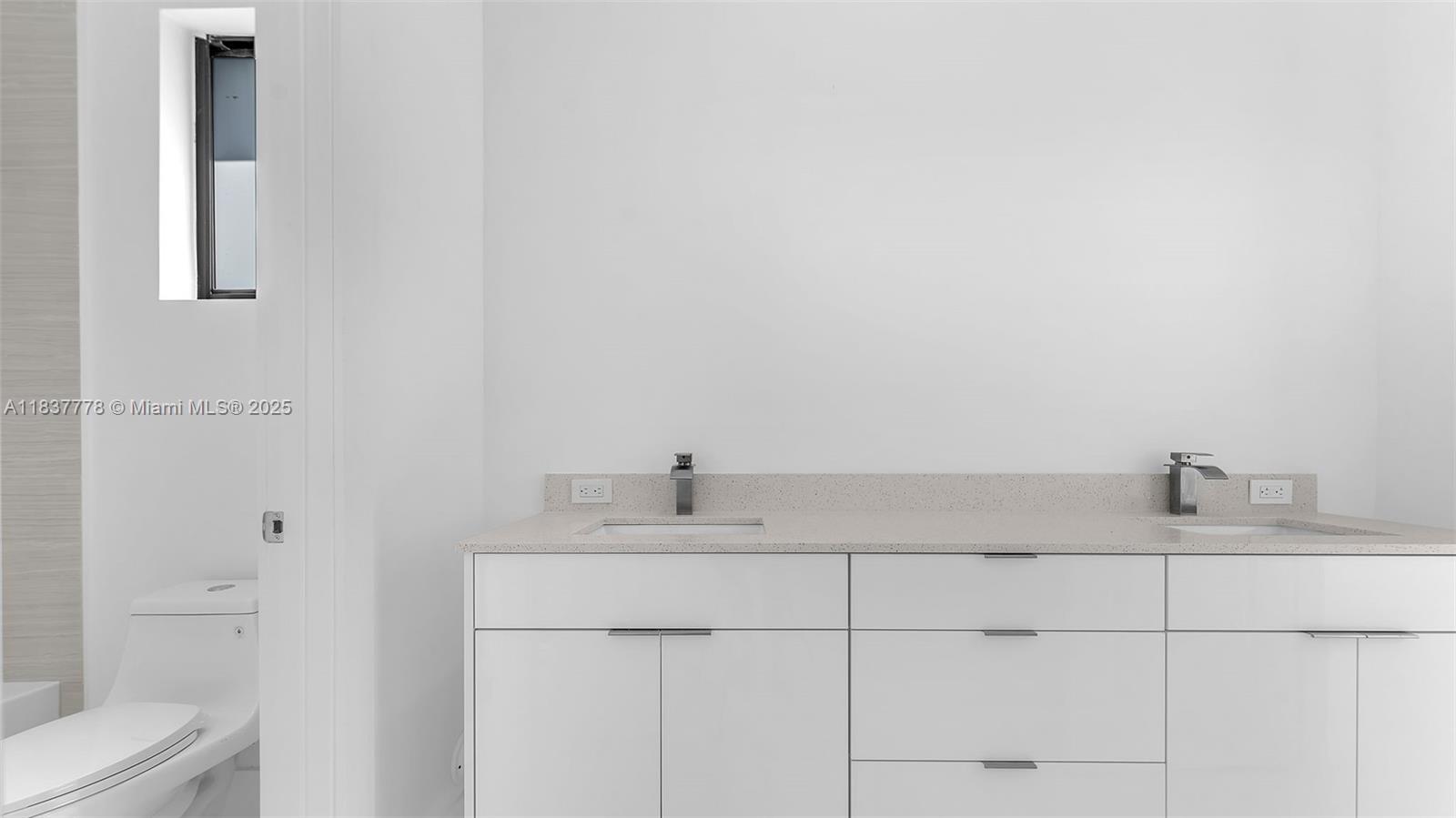 23120 Southwest 154th Court Miami, FL 33170 - Photo 19 of 51 a bathroom with a sink and a toilet