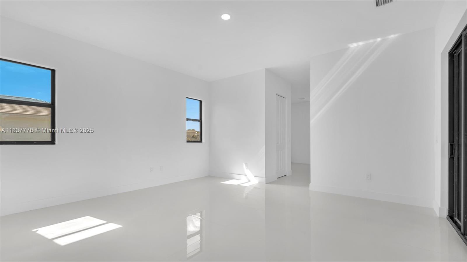 23120 Southwest 154th Court Miami, FL 33170 - Photo 27 of 51 a view of empty room