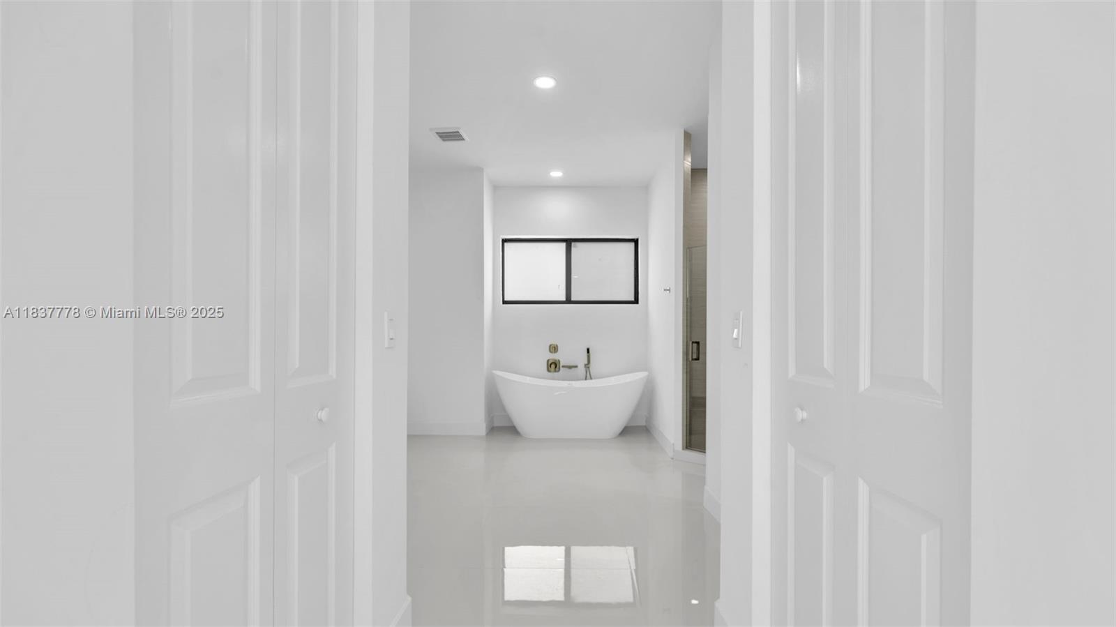 23120 Southwest 154th Court Miami, FL 33170 - Photo 29 of 51 a bathroom with a toilet