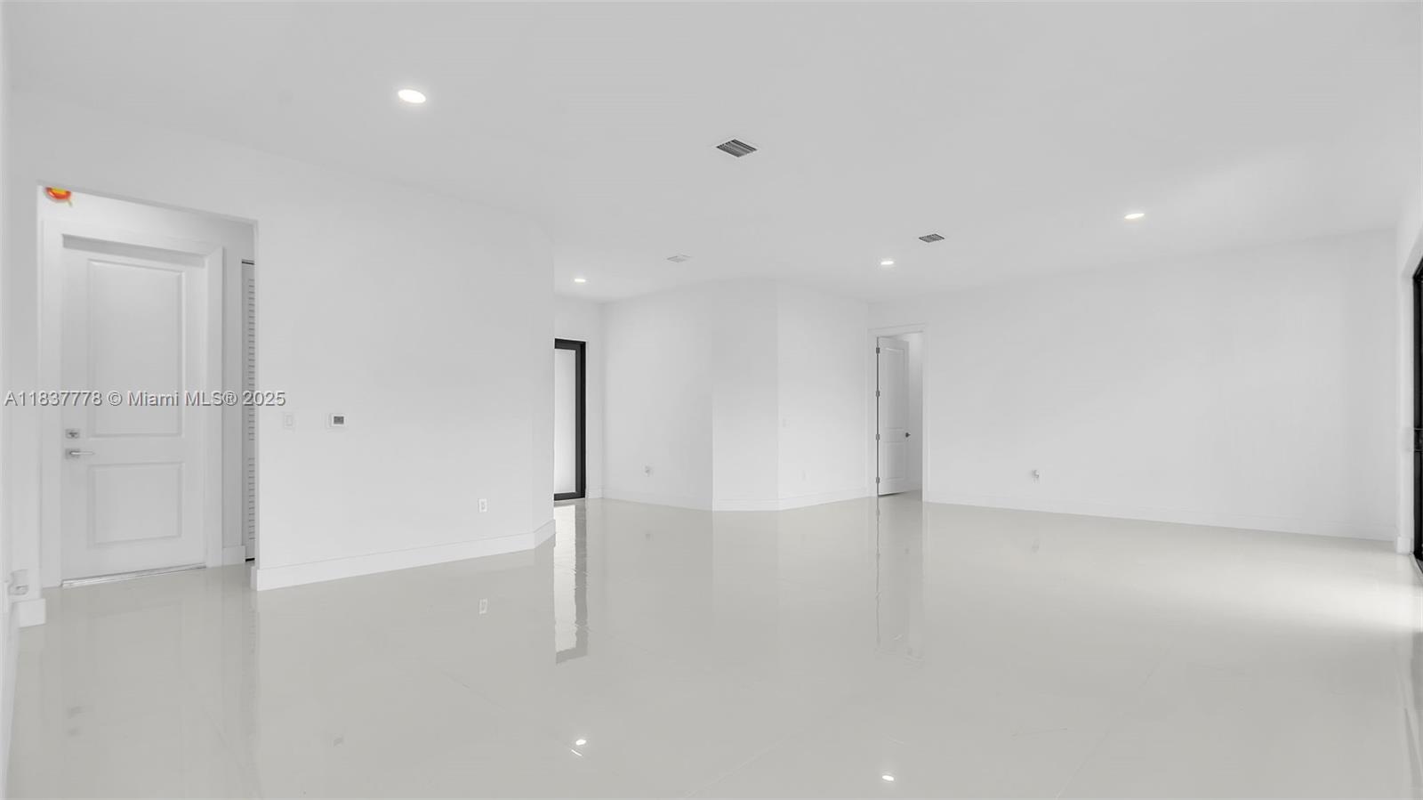 23120 Southwest 154th Court Miami, FL 33170 - Photo 8 of 51 a view of an empty room