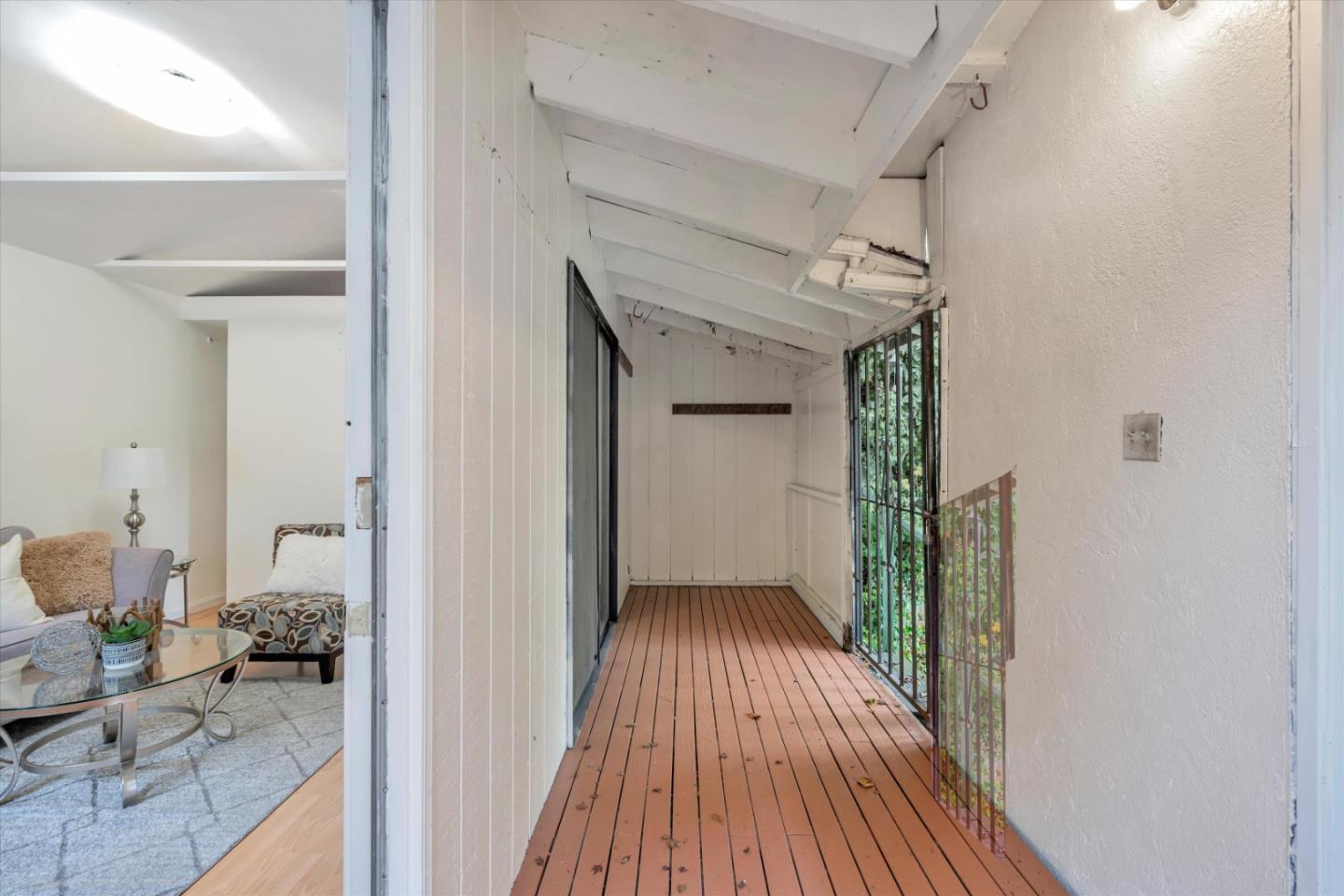 1904 Blake Street Berkeley, CA 94704 - Photo 17 of 24 a view of a hallway view with wooden floor and furniture