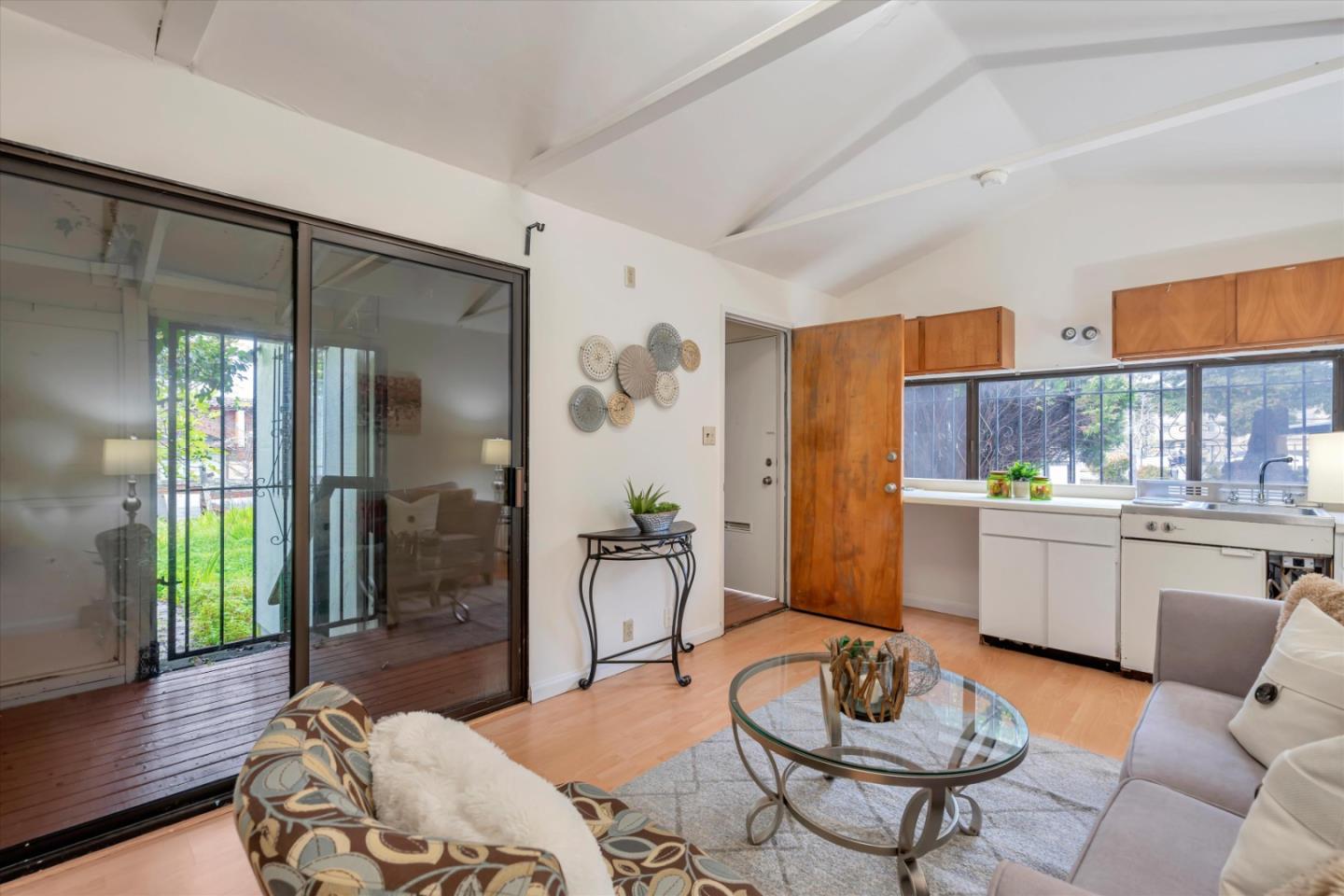 1904 Blake Street Berkeley, CA 94704 - Photo 19 of 24 a living room with furniture and a wooden floor