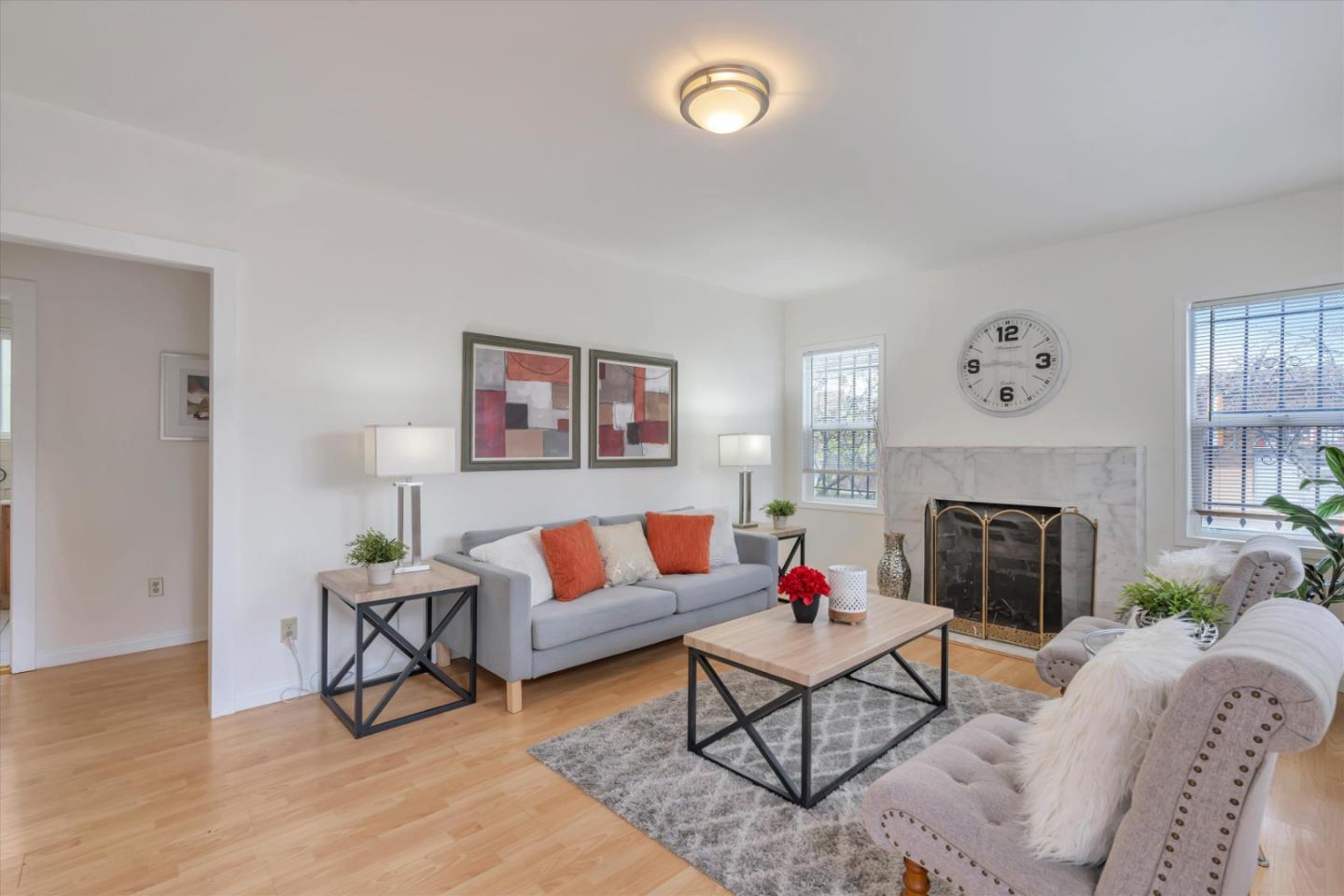 1904 Blake Street Berkeley, CA 94704 - Photo 3 of 24 a living room with furniture and a fireplace