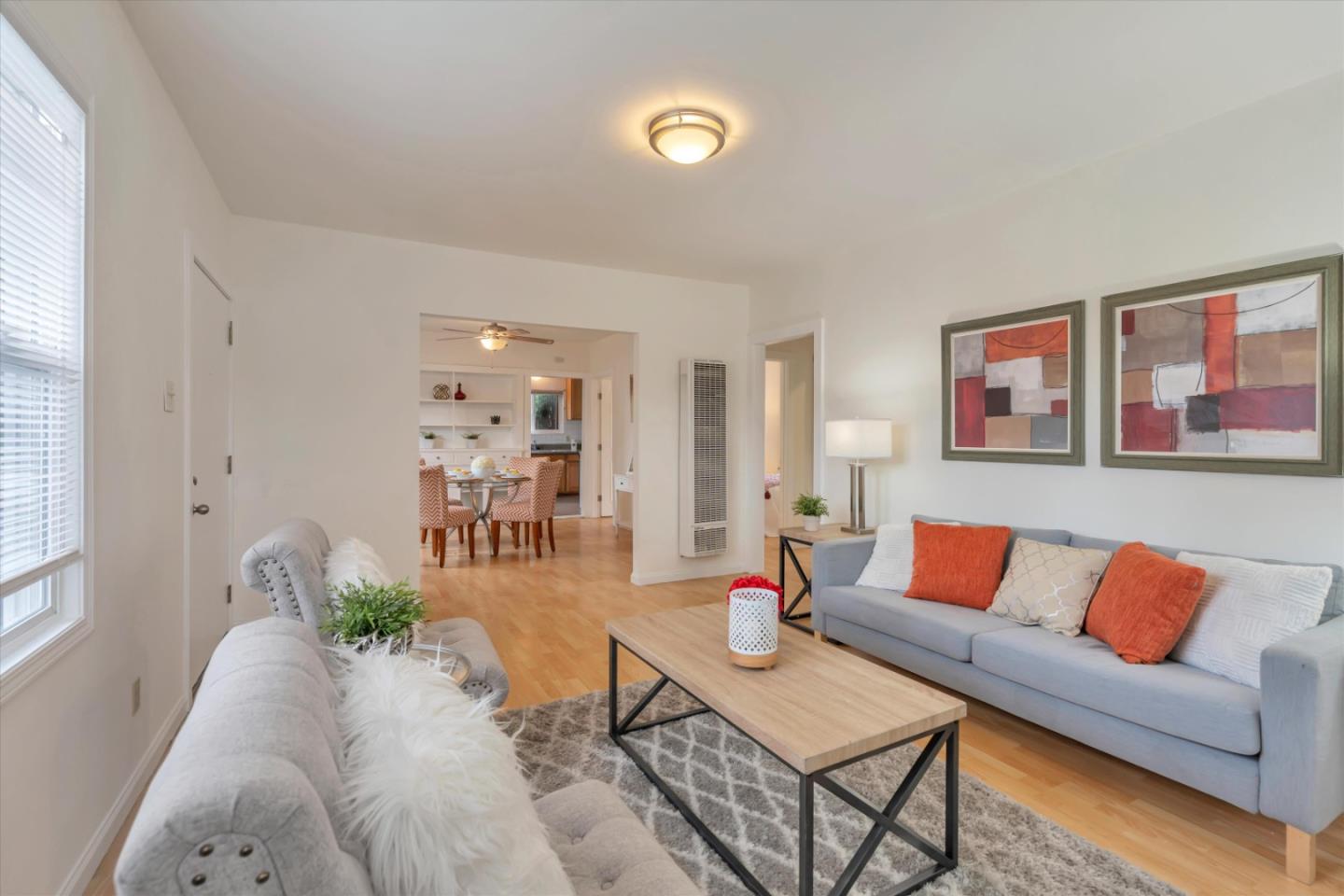 1904 Blake Street Berkeley, CA 94704 - Photo 6 of 24 a living room with furniture and wooden floor