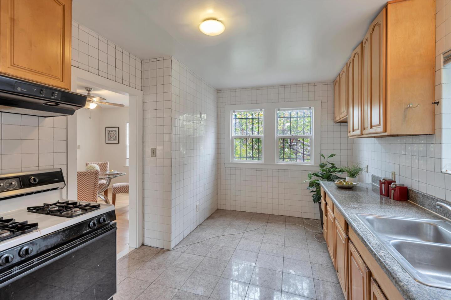 1904 Blake Street Berkeley, CA 94704 - Photo 10 of 24 a kitchen that has a sink and a stove