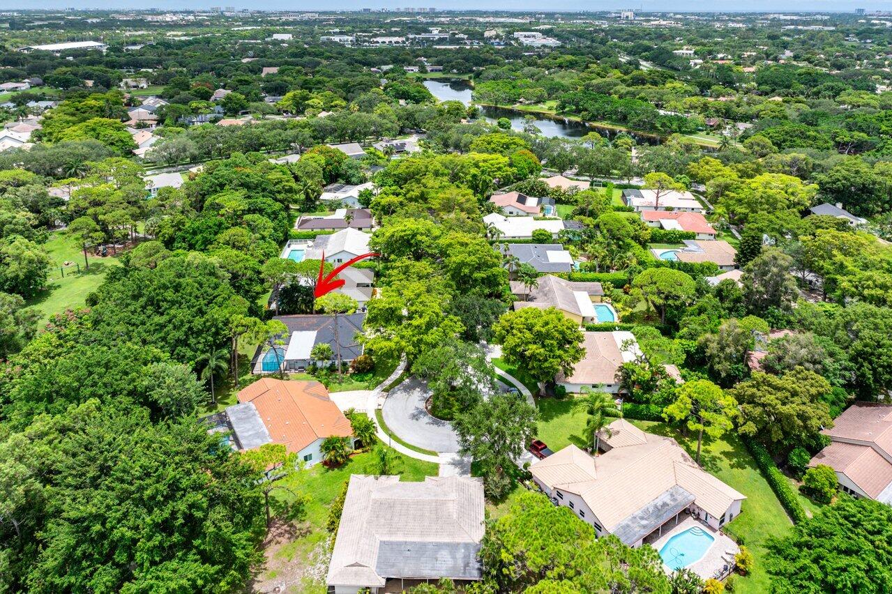 2425 Northwest 36th Street Boca Raton, FL 33431 - Photo 27 of 31 an aerial view of residential houses with outdoor space and trees