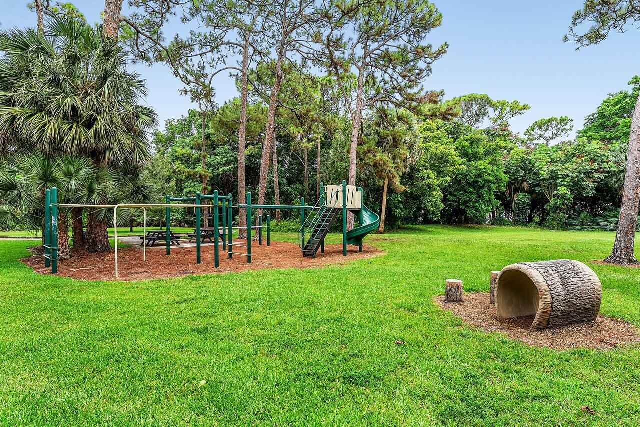 2425 Northwest 36th Street Boca Raton, FL 33431 - Photo 28 of 31 a view of a garden with an outdoor space