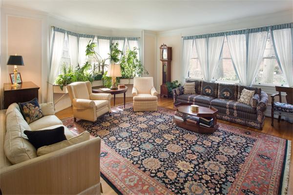 51 Upland Road Brookline, MA 02445 - Photo 3 of 14 a living room with furniture and large windows