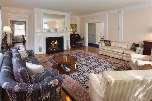 51 Upland Road Brookline, MA 02445 - Photo 4 of 14 a living room with furniture and a fireplace