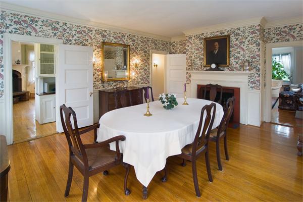 51 Upland Road Brookline, MA 02445 - Photo 5 of 14 a view of a dining room with furniture and wooden floor