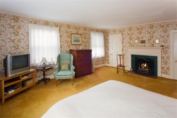 51 Upland Road Brookline, MA 02445 - Photo 9 of 14 a living room with furniture and a fireplace