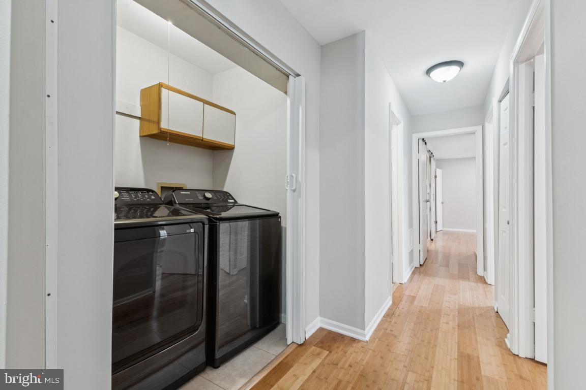 7402 Rokeby Drive Manassas, VA 20109 - Photo 12 of 25 Laundry room with upscale washer & dryer.
