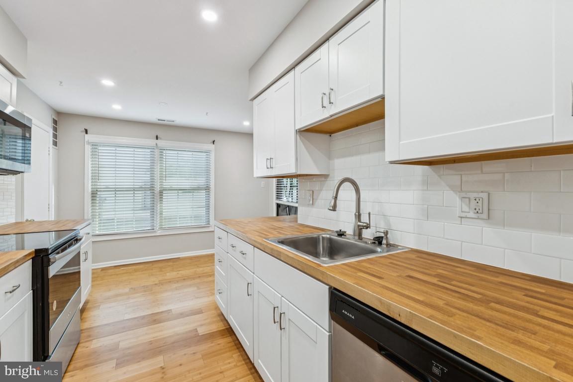 7402 Rokeby Drive Manassas, VA 20109 - Photo 9 of 25 Updated kitchen with birch countertops