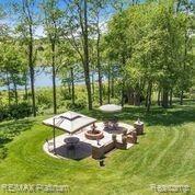 1848 Fox Ridge Drive Howell, MI 48843 - Photo 48 of 68 Enjoy Lunch Overlooking the Lake