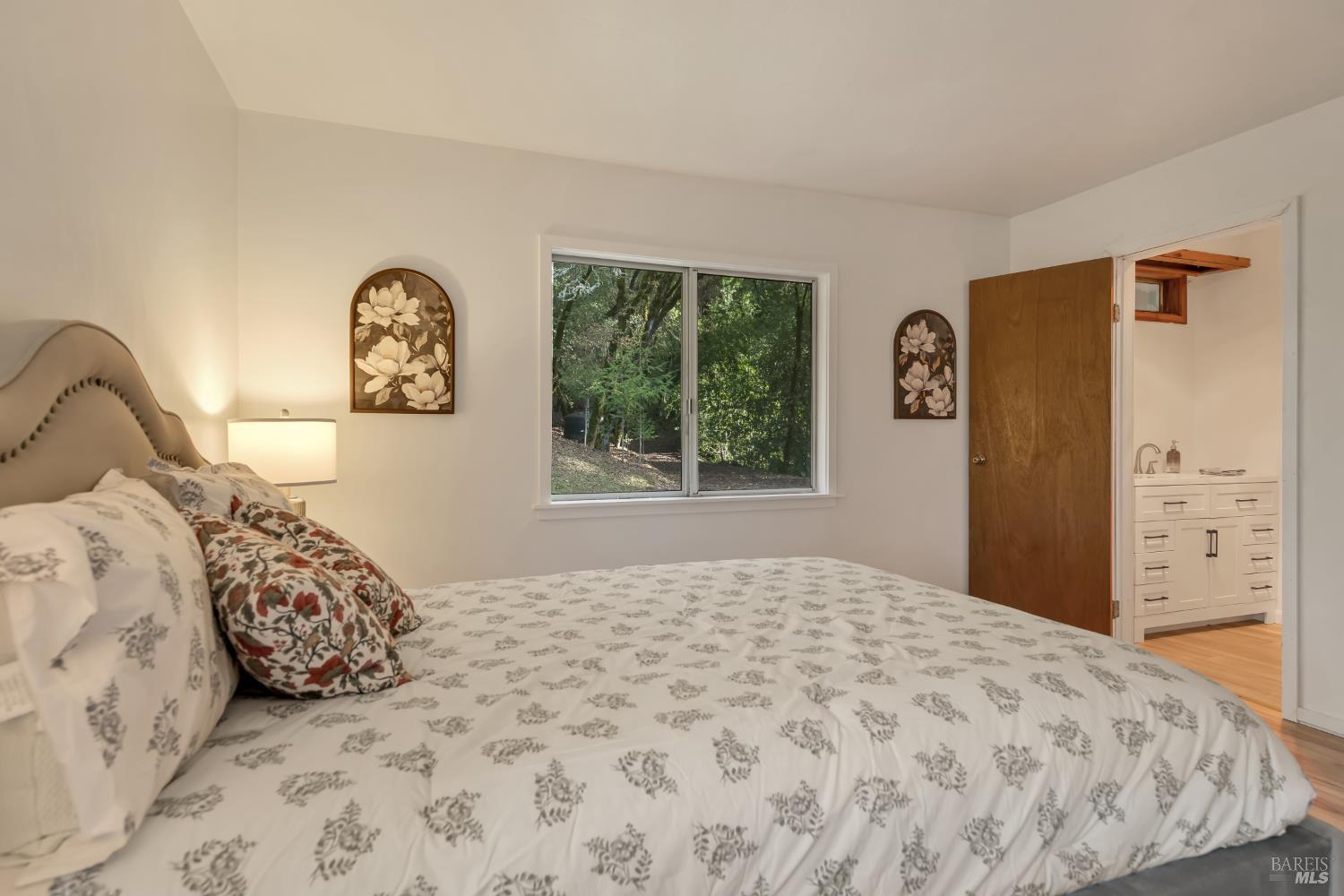 3100 Mill Creek Road Healdsburg, CA 95448 - Photo 19 of 41 a bedroom with a bed and a window