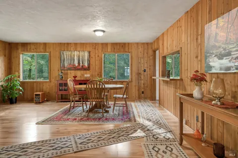 a work room with furniture and a window
