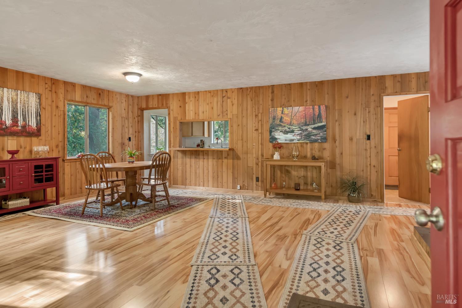 3100 Mill Creek Road Healdsburg, CA 95448 - Photo 27 of 41 a bedroom with furniture and large windows