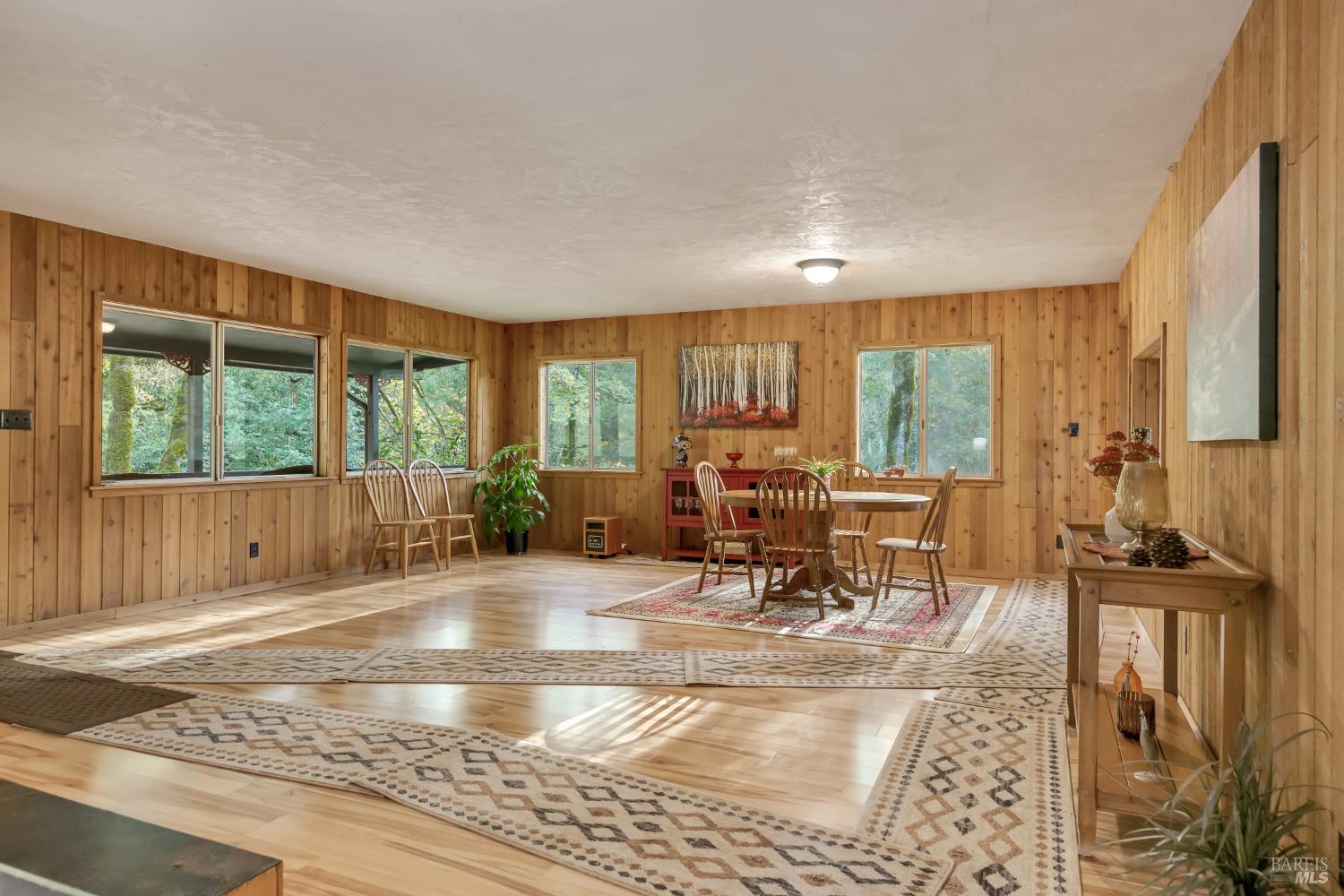 3100 Mill Creek Road Healdsburg, CA 95448 - Photo 28 of 41 a view of a dining room with furniture water view and a large window