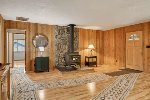 a view of a livingroom with furniture and cabinet