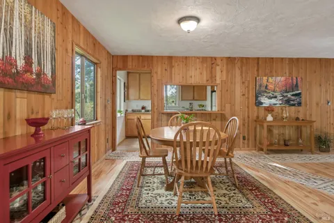 a view of a dining room with furniture