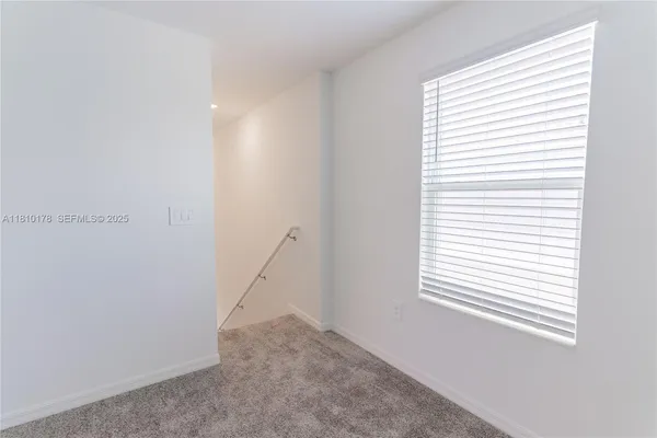 a view of a small space with a window