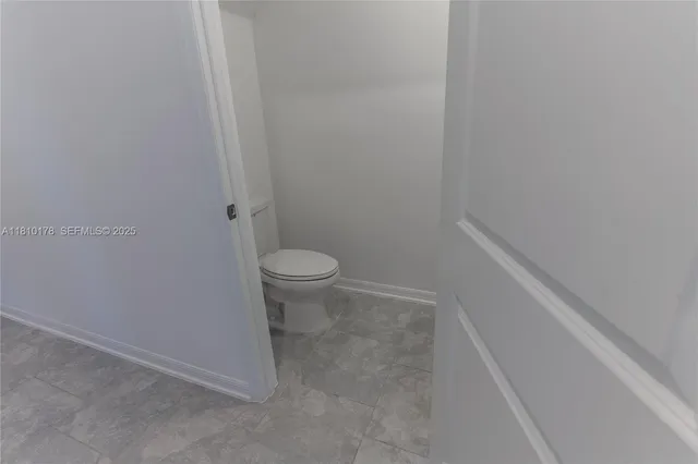 a view of bathroom and a sink