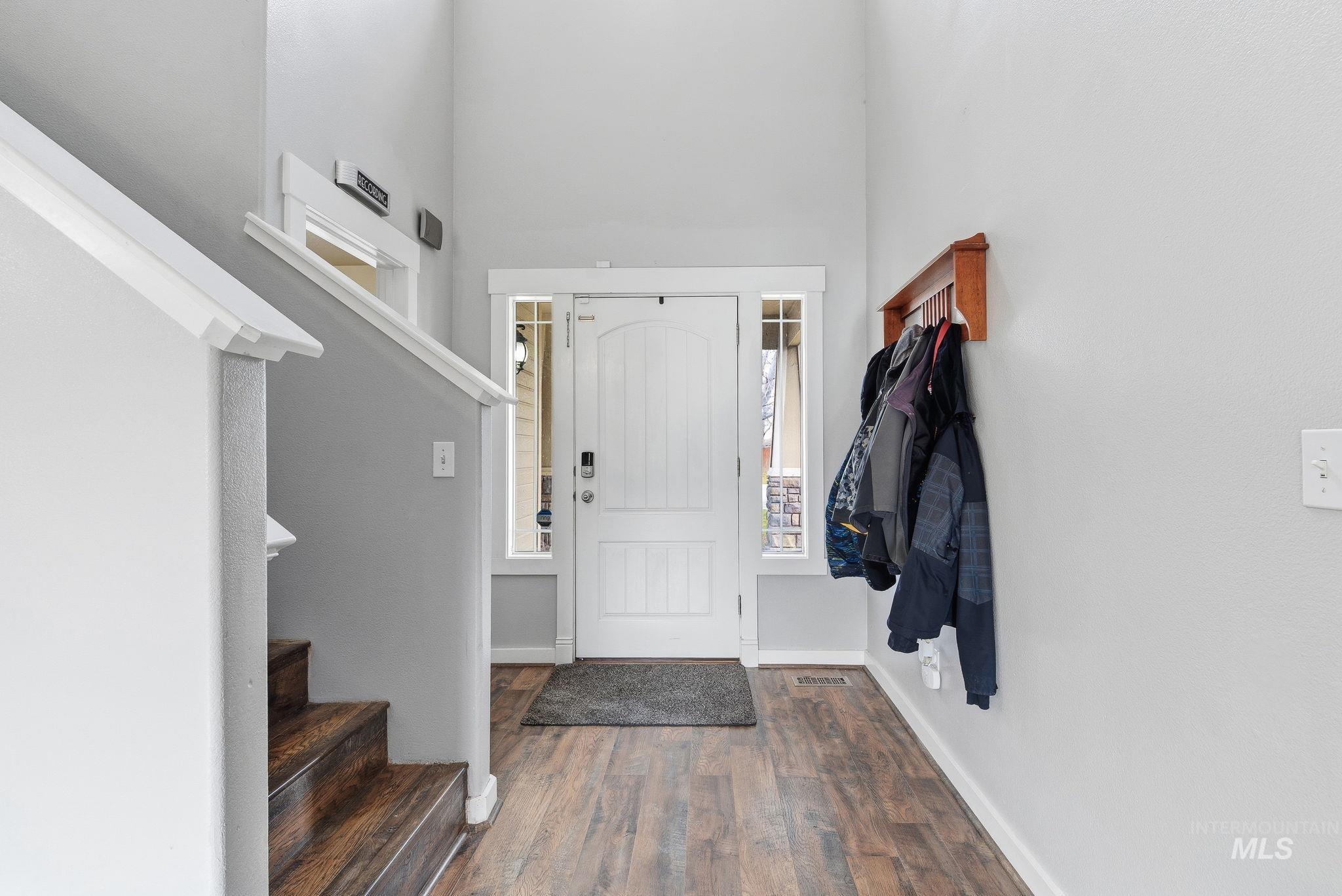 2520 Summercrest Street Caldwell, ID 83607 - Photo 2 of 42 Foyer featuring stairs and dark wood-type flooring