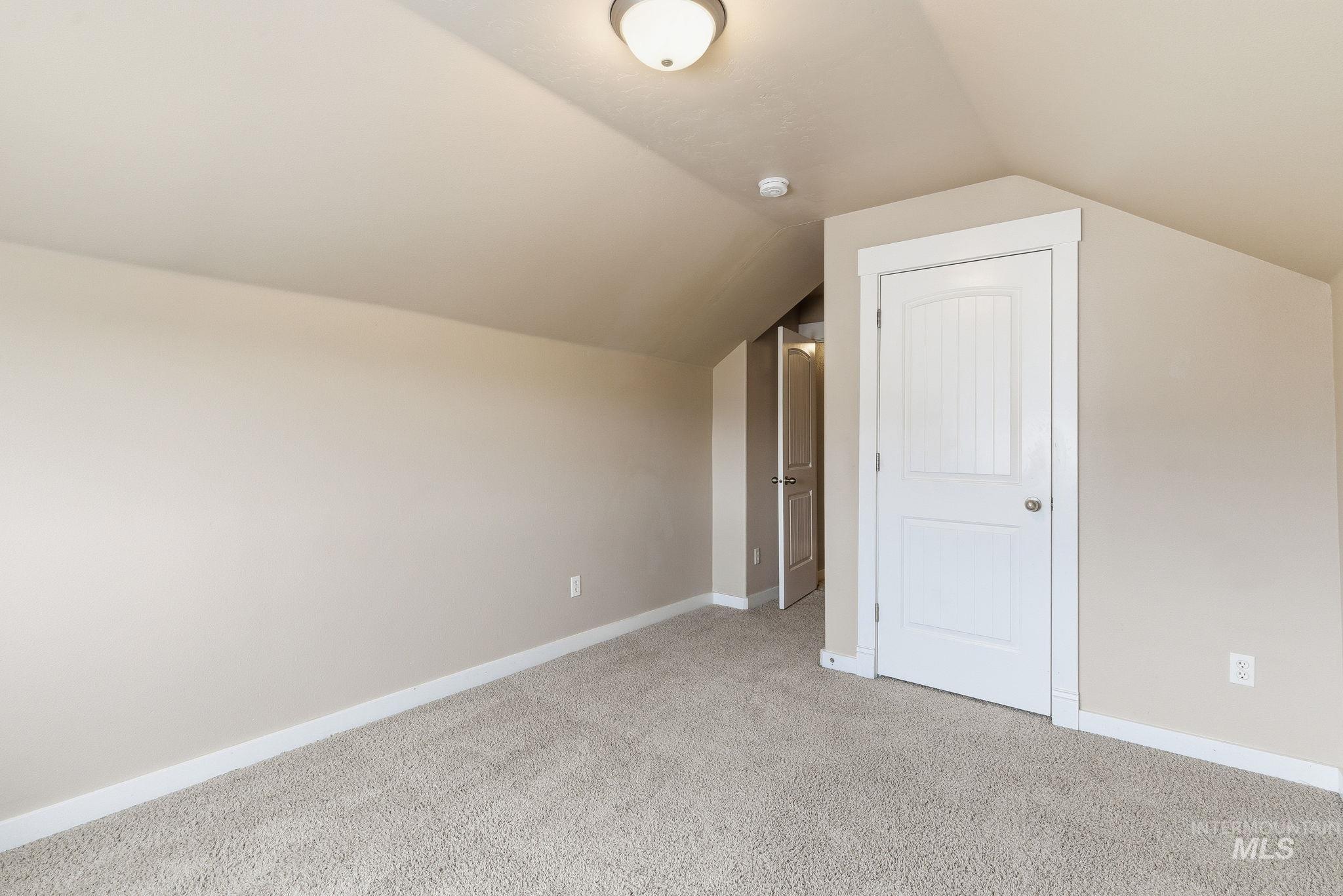 2520 Summercrest Street Caldwell, ID 83607 - Photo 23 of 42 Bonus room with carpet and vaulted ceiling