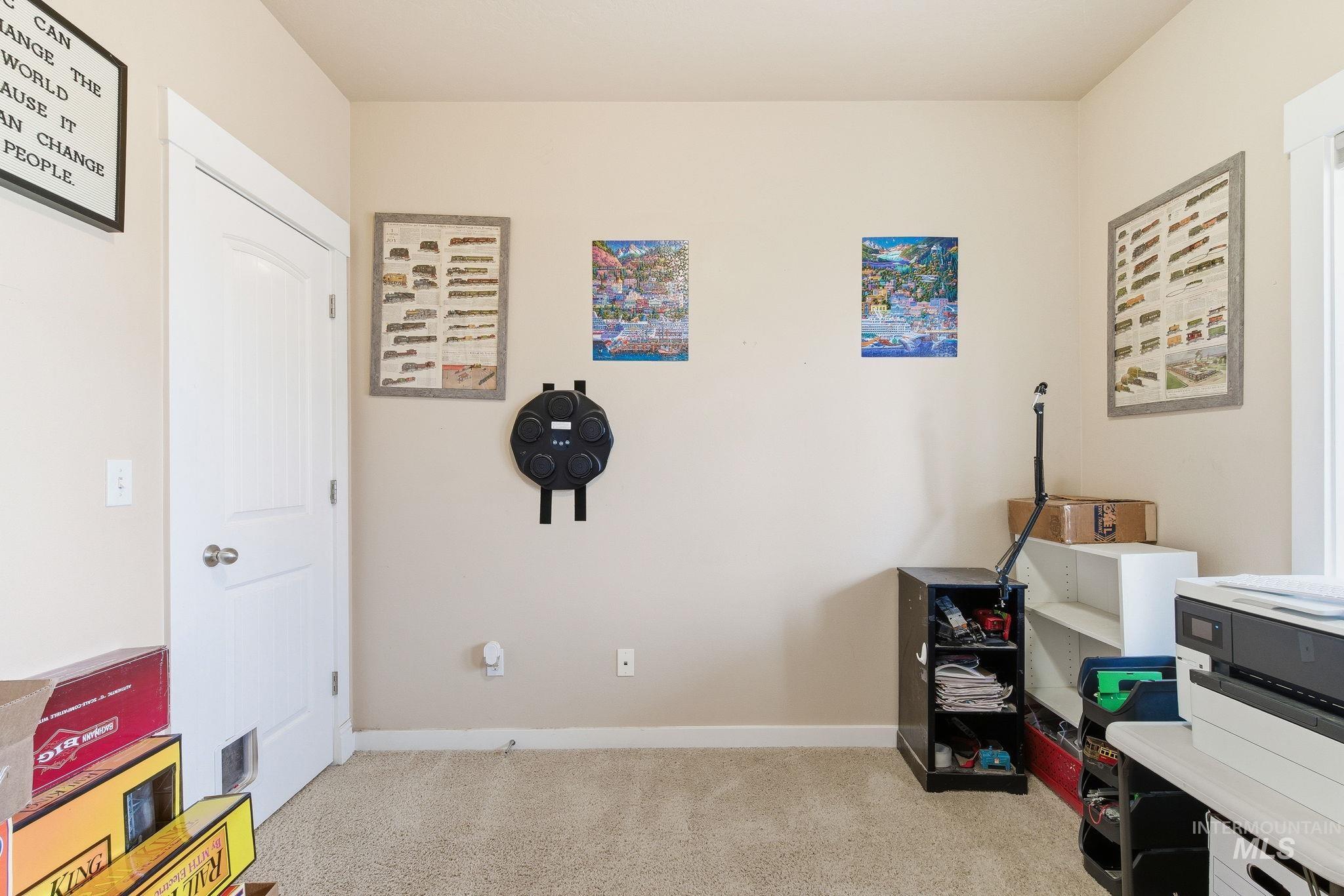 2520 Summercrest Street Caldwell, ID 83607 - Photo 29 of 42 Rec room featuring light colored carpet and baseboards