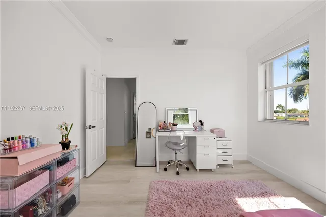 a bathroom with a double vanity sink toilet and shower
