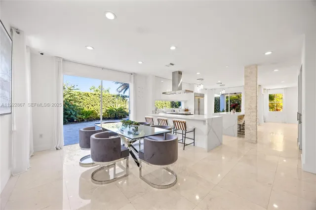 a view of work space with furniture and window