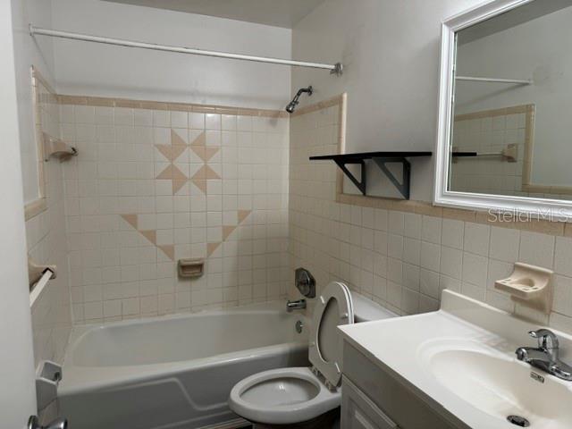 2075 Howell Branch Road, Unit 101 Maitland, FL 32751 - Photo 8 of 9 a bathroom with a sink toilet and shower
