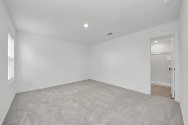 an empty room with a natural light