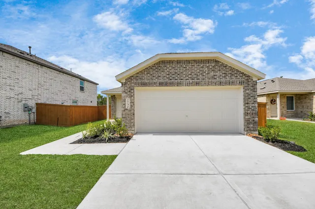a view of a house with a garden