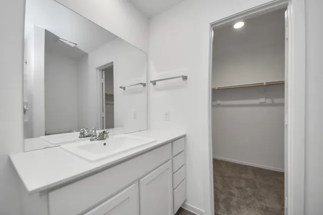 a view of a room with shelf on the wall