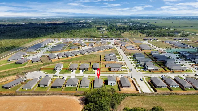 swimming pool with outdoor seating and yard