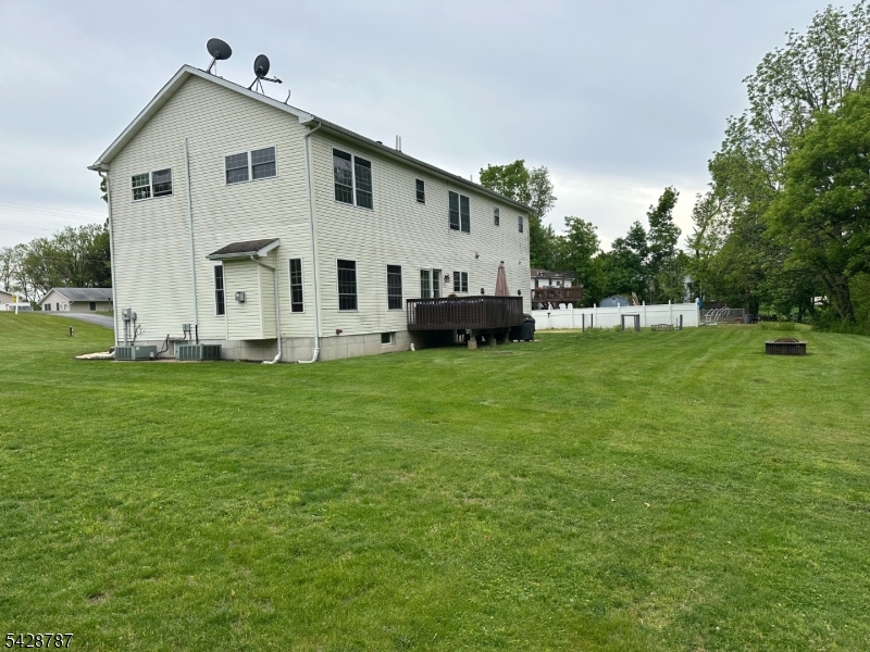 70 Holland Road Wantage, NJ 07461 - Photo 32 of 35 a view of a house with a yard