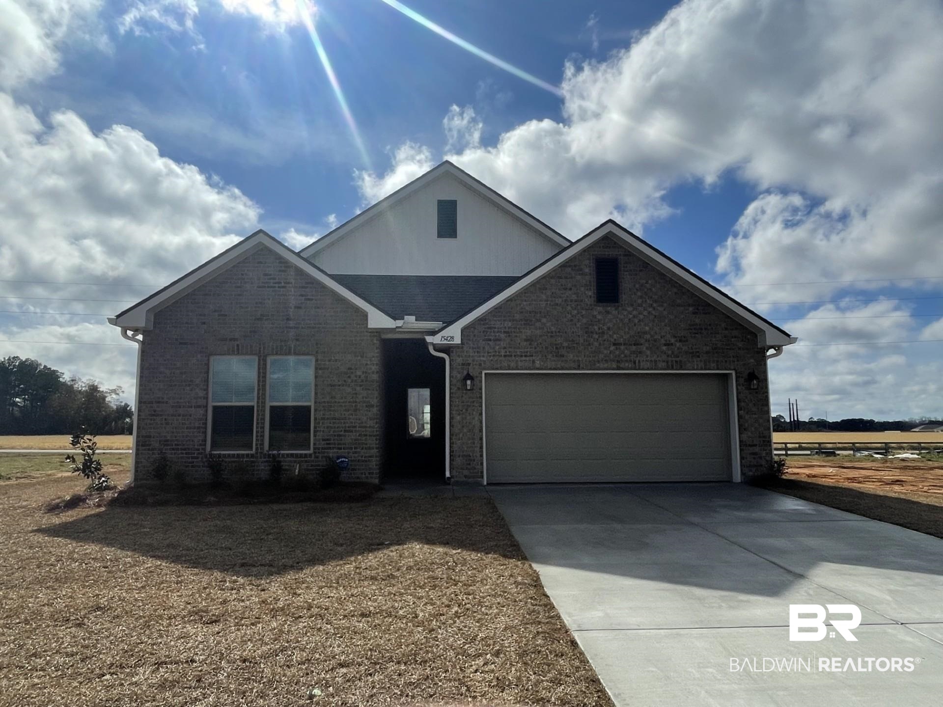 15428 Yellowstone Drive Silverhill, AL 36576 - Photo 1 of 3 View of front of house with a garage