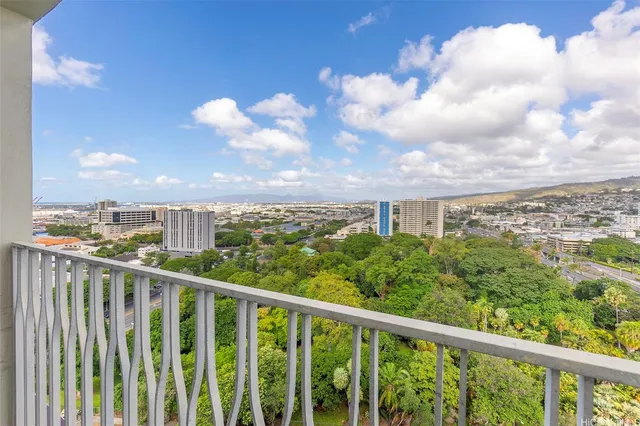 a view of a city skyline from a balcony