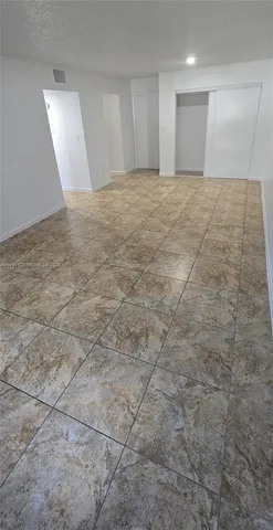 an empty room with a natural light