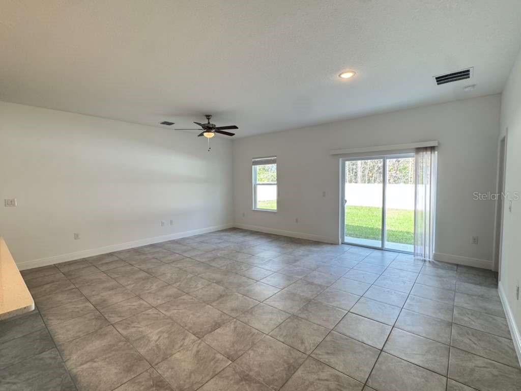 16054 Southwest 55th Avenue Road Ocala, FL 34473 - Photo 19 of 58 a view of an empty room with a window
