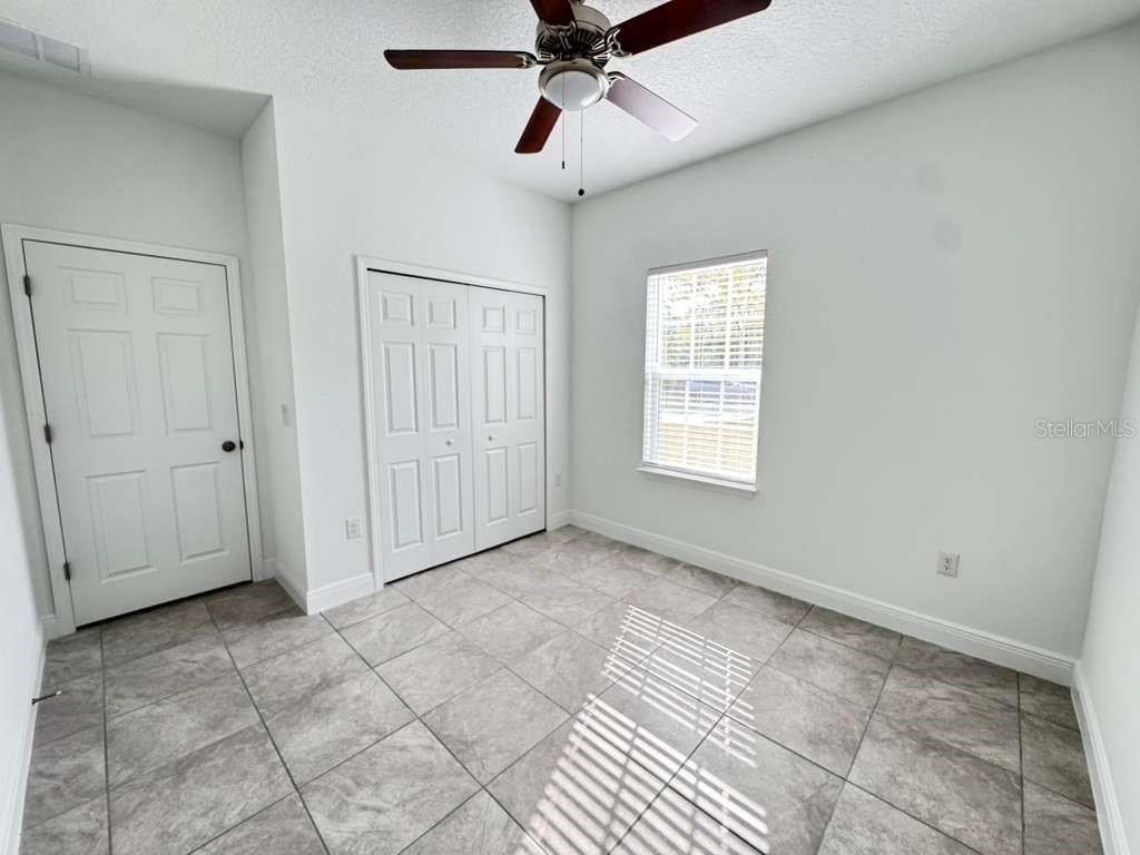 16054 Southwest 55th Avenue Road Ocala, FL 34473 - Photo 31 of 58 a view of an empty room with a window