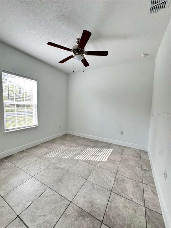 16054 Southwest 55th Avenue Road Ocala, FL 34473 - Photo 36 of 58 a view of an empty room and window