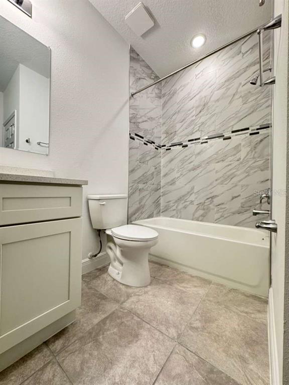 16054 Southwest 55th Avenue Road Ocala, FL 34473 - Photo 40 of 58 a bathroom with a toilet and a shower