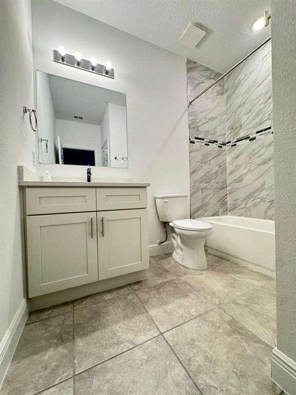 16054 Southwest 55th Avenue Road Ocala, FL 34473 - Photo 41 of 58 a bathroom with a toilet sink and mirror